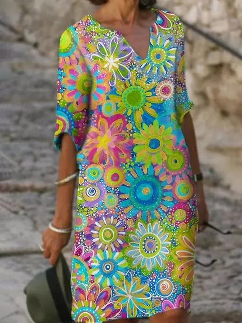 Elovelle | Women's Flowy Dress with Floral Print and Sleeveless Design